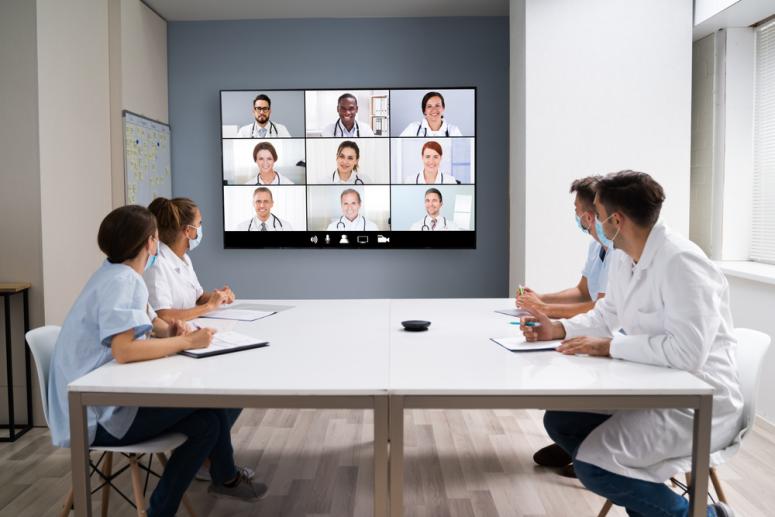 doctors sitting around a Zoom video call