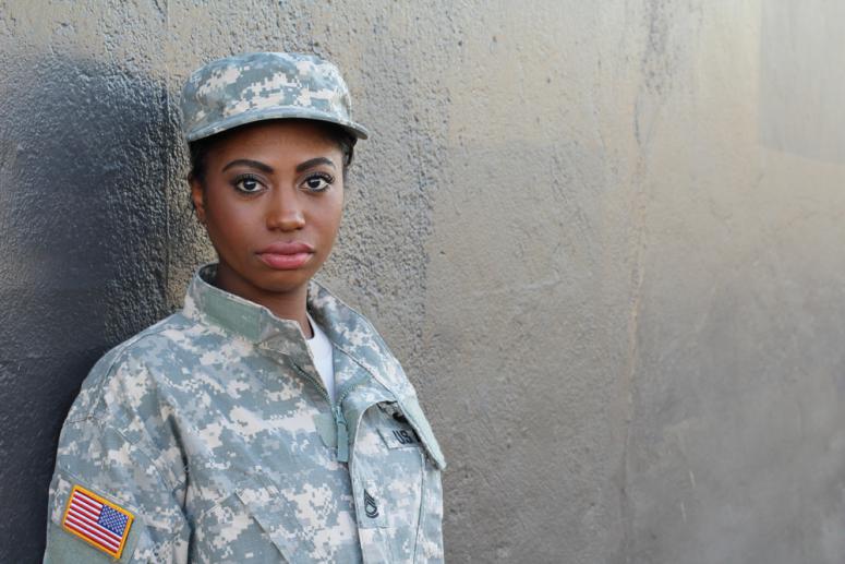 Veteran Female African American Soldier with Neutral Expression and Copy Space